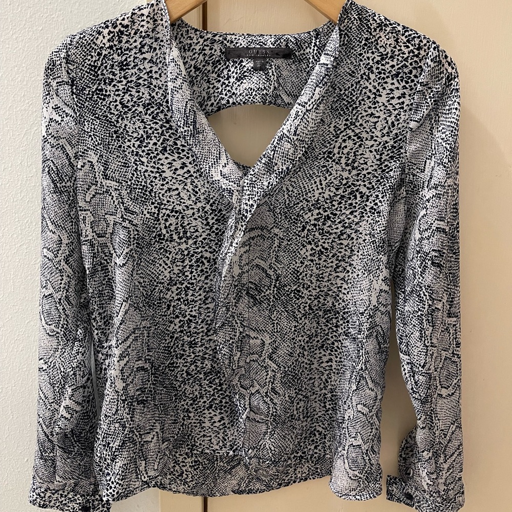A bundle of two Guess blouse.Color blue and light  brown.  Worn twice almost new